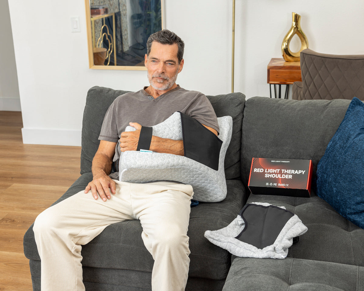 Person resting in bed with Shoulder Sleeper pillow for chronic pain relief